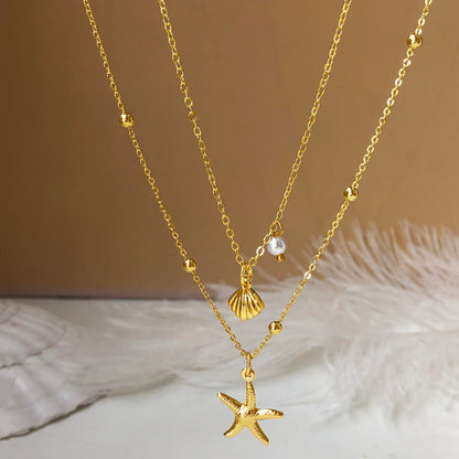 Zeffy Shell Necklace for Women,14K Gold Plated Layered Starfish Conch SeaShell Pearl Pendant Charm Necklace Stack Waterproof Dainty Beach Jewelry for Summer Vacation